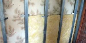 Insulation of the walls of a panel house from the outside Insulating a wall in a panel house